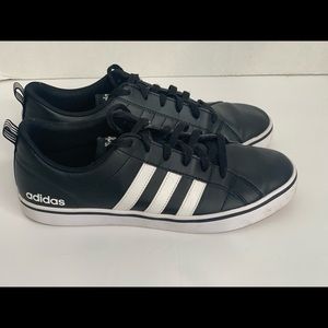 Adidas men’s black with white stripes size 10